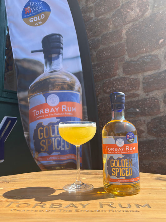 Torbay Rum golden spiced rum with cocktail on the English Riviera Devon