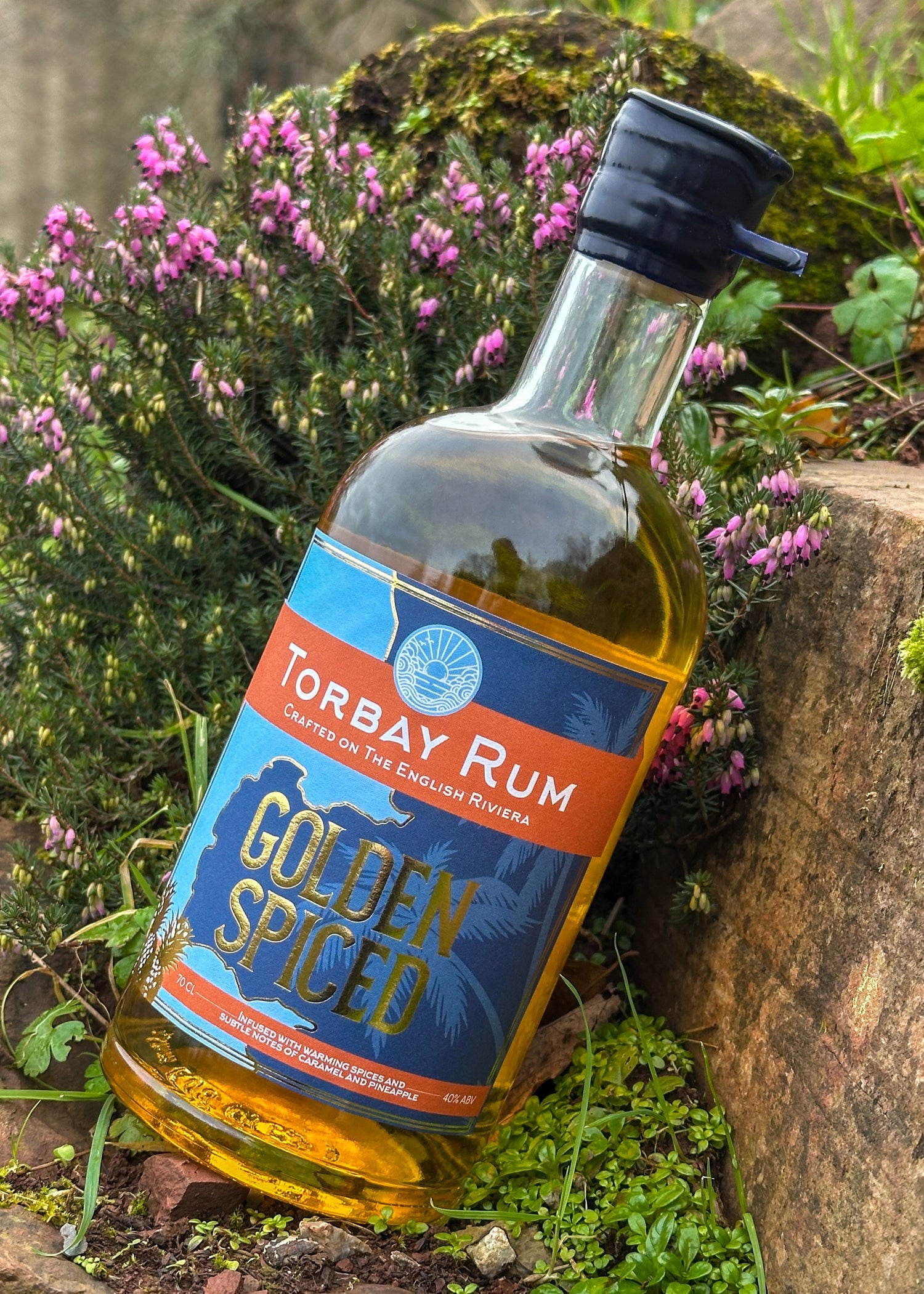 golden Spiced Rum in front of cockington church