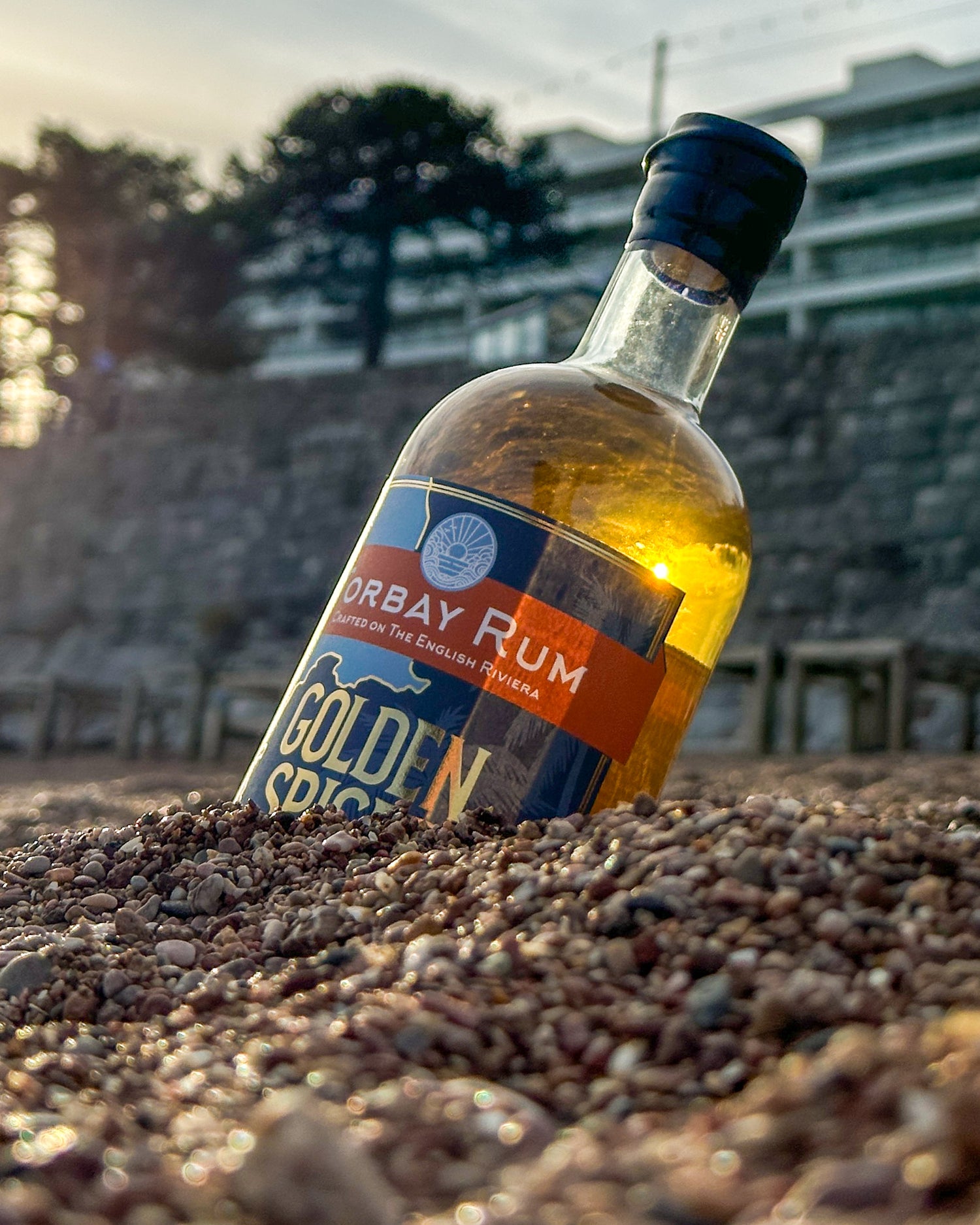 Golden Spiced rum in Torre Abbey sand