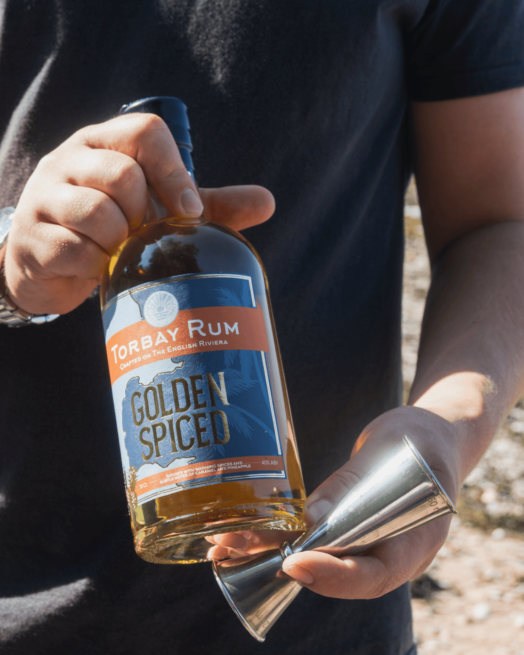 golden spiced torbay rum at elberry cove beach in torbay devon